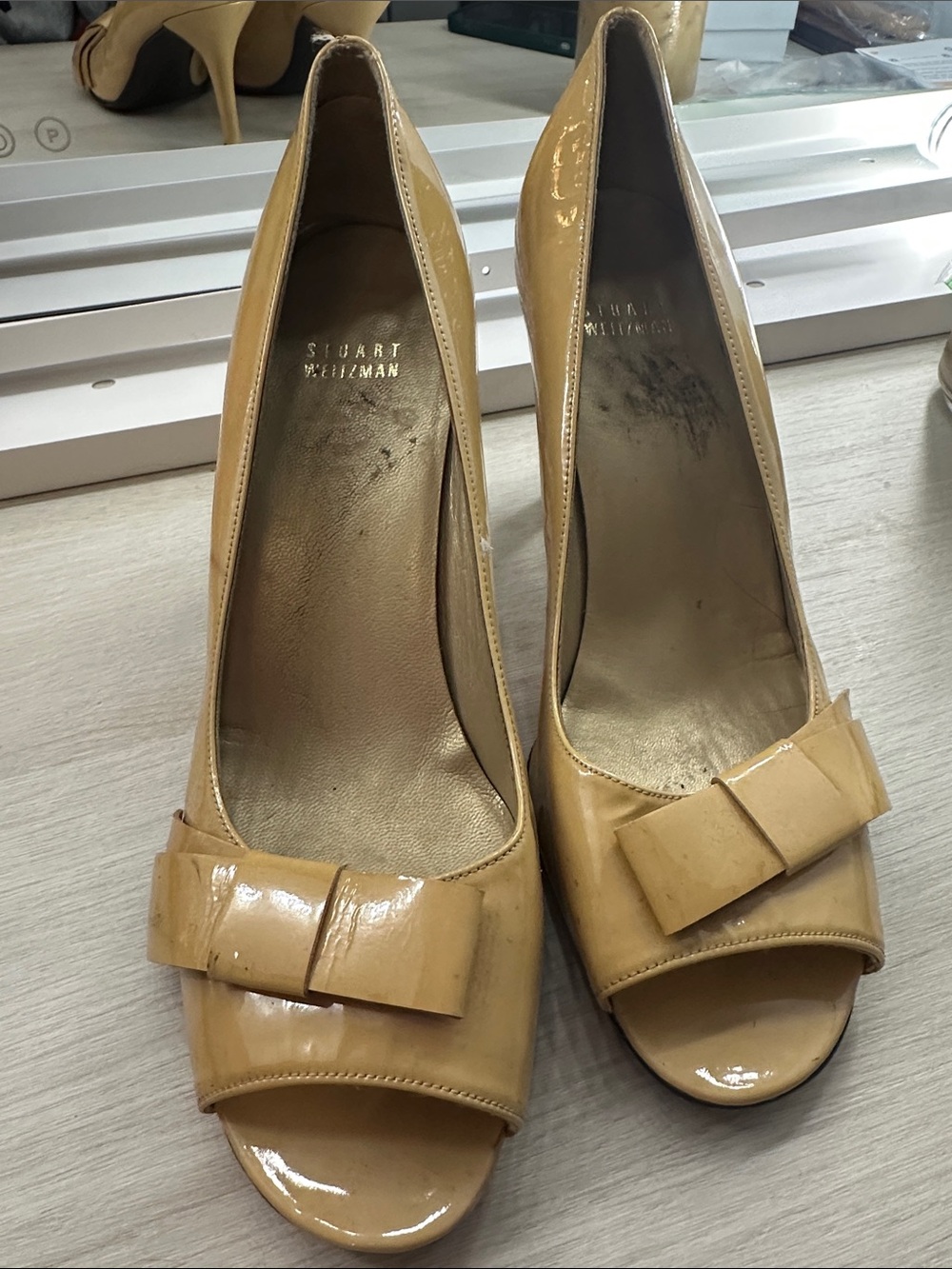 Stuart Weitzman Patent Peep-Toe Pumps in Beige with Bow
